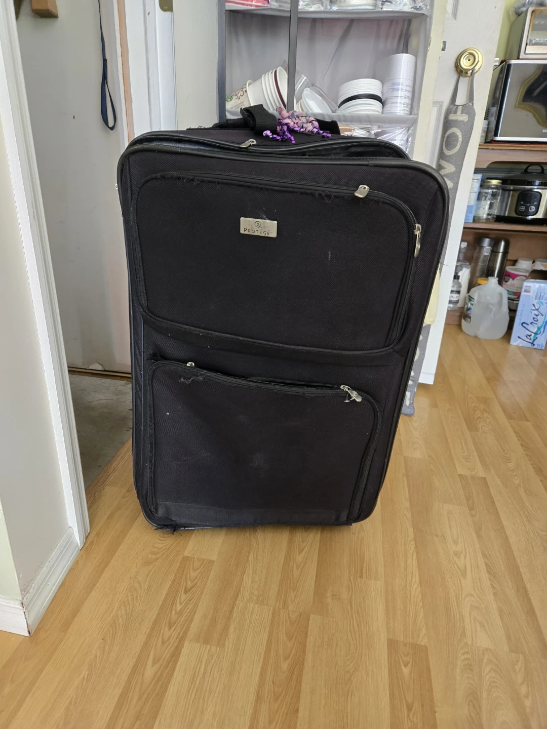Black Rolling Suitcase full of shoes - photo 2
