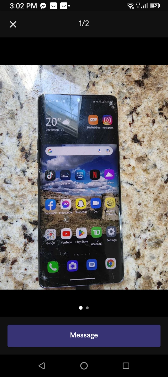 Black LG Velvet Smartphone with Cracked Glass