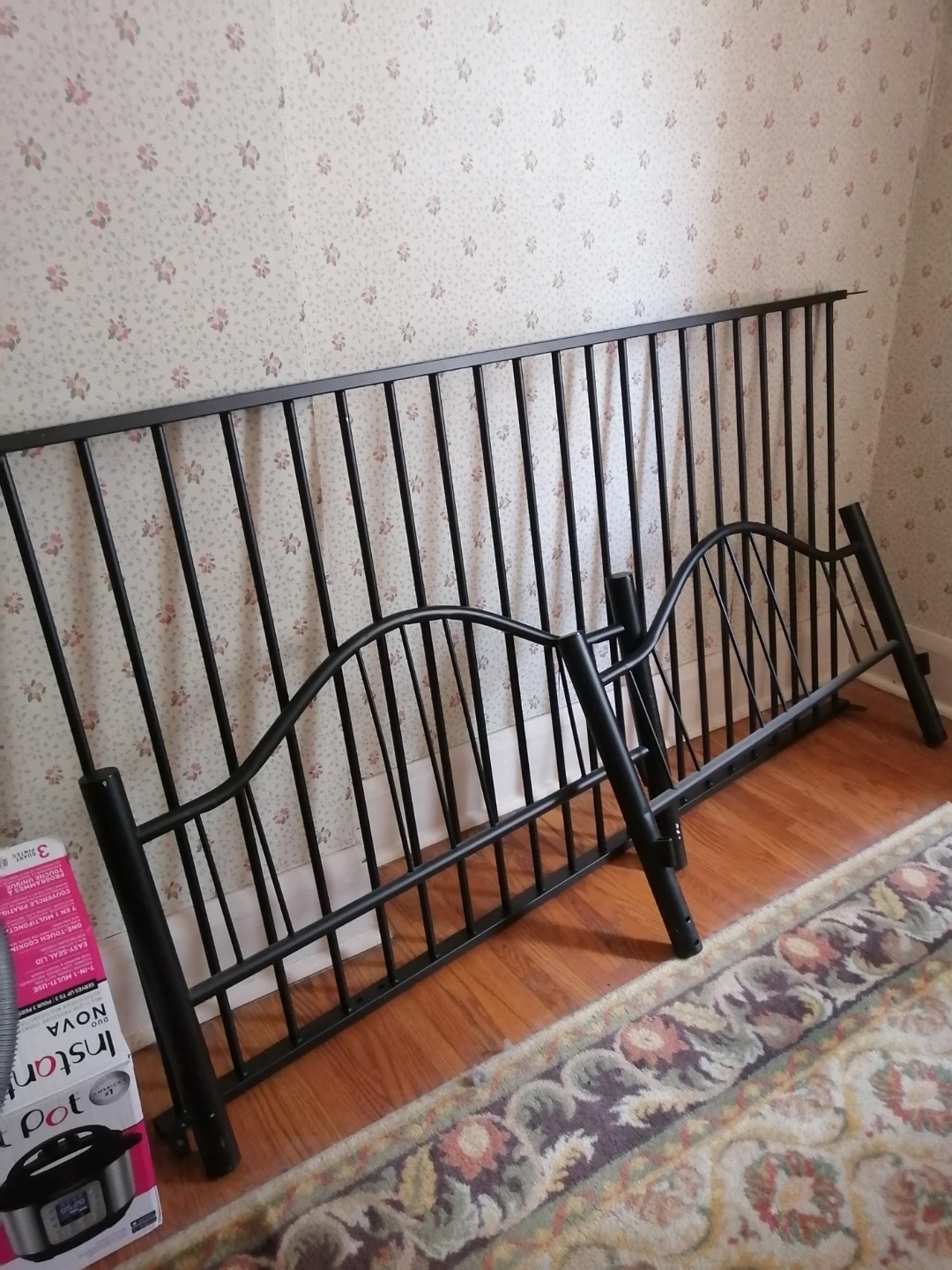 Black metal single bed frame