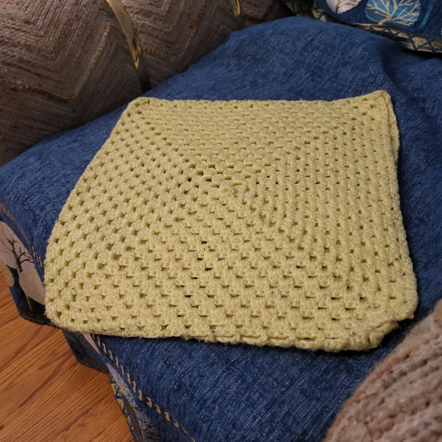 Yellow crocheted pillow cover