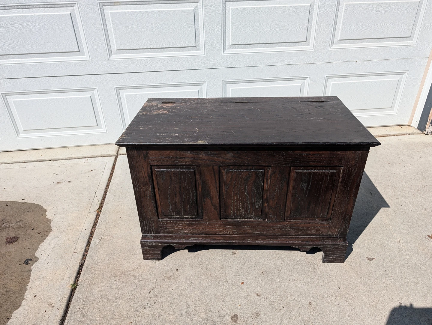 Solid wood storage bench with hinged lid