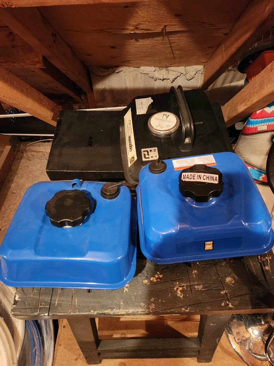 Two Blue Generator Fuel Tanks