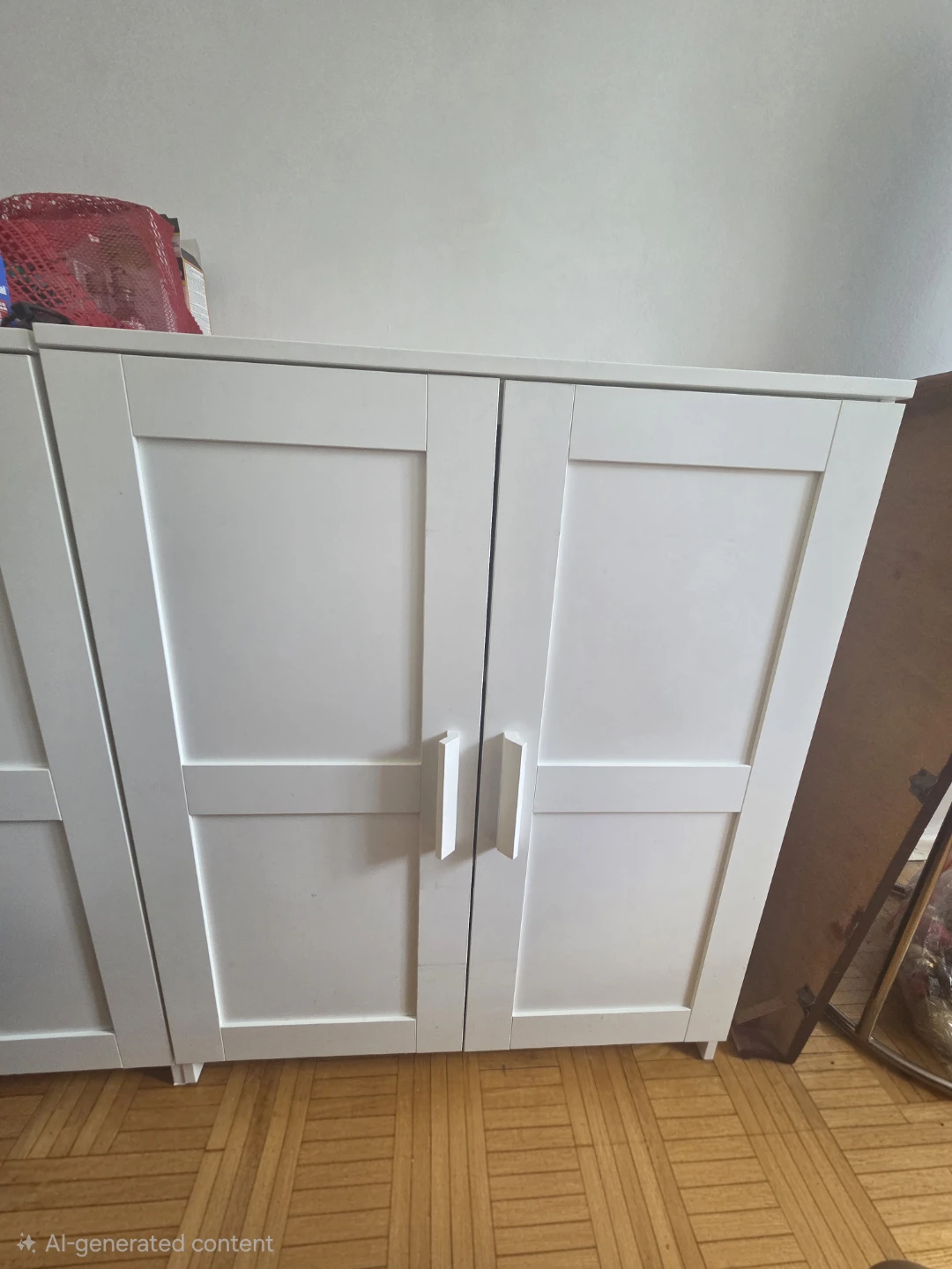 2 white IKEA BRIMNES two-door cabinets