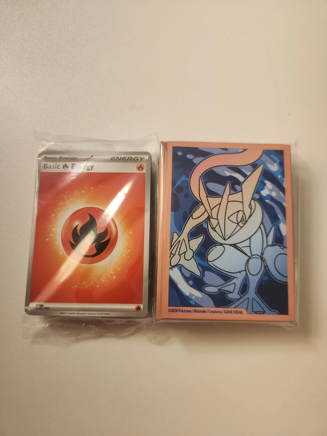 40 Energy Cards and/or 65 Chaos Rising Card Sleeves