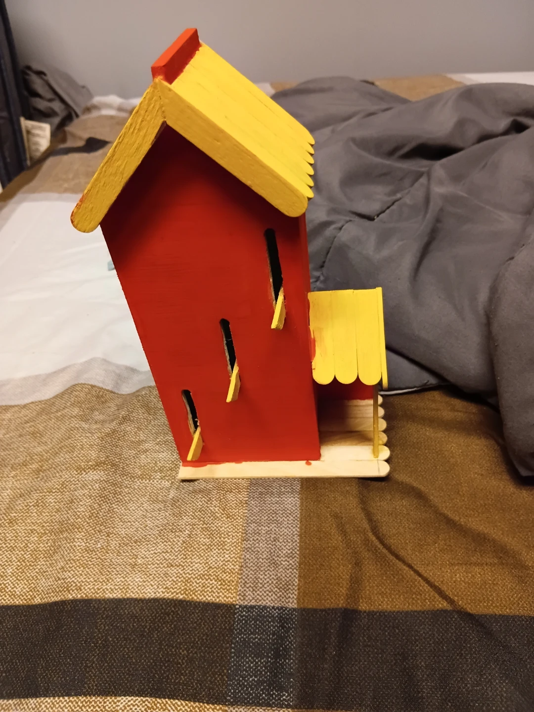 Red and Yellow Miniature House Craft