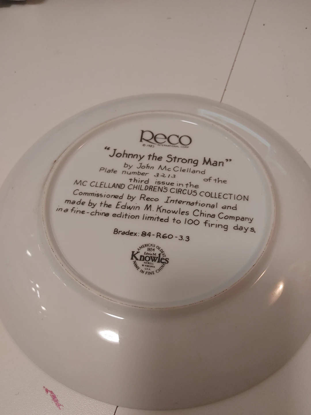 Peco Johnny the Strong Man Decorative Plate by John McClelland