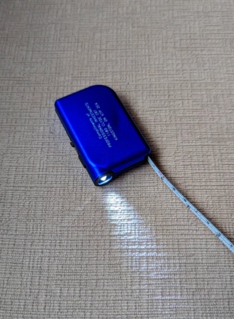 Portable Flashlight and Tape Measurer Tool