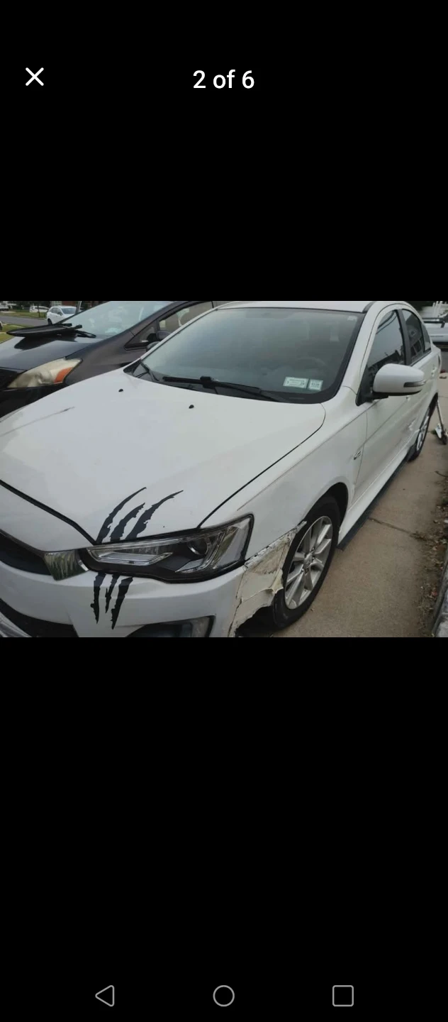 Pearlwhite Mitsubishi Lancer Es - photo 2