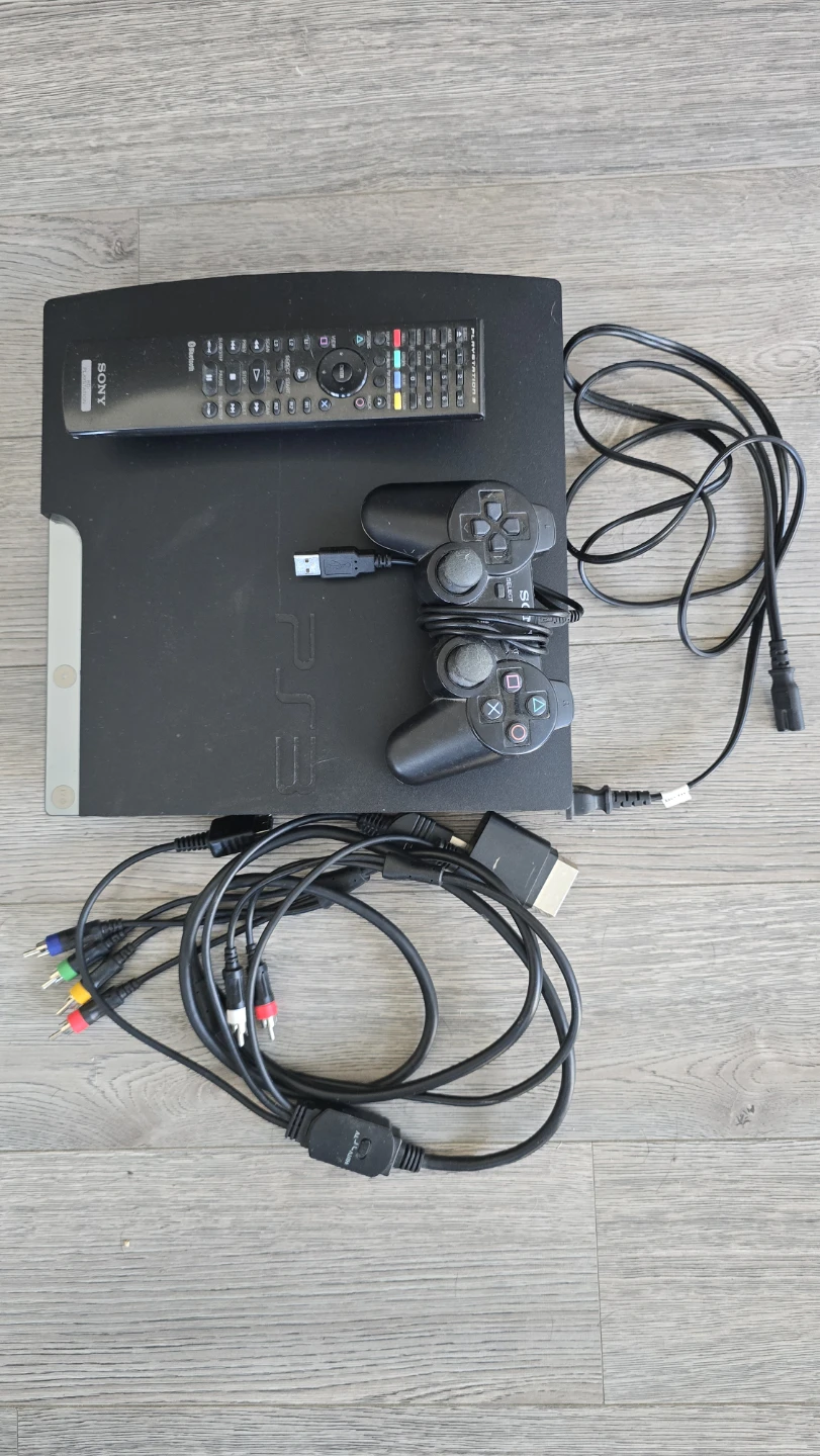 Sony PlayStation 3 Console with Controllers and Cables