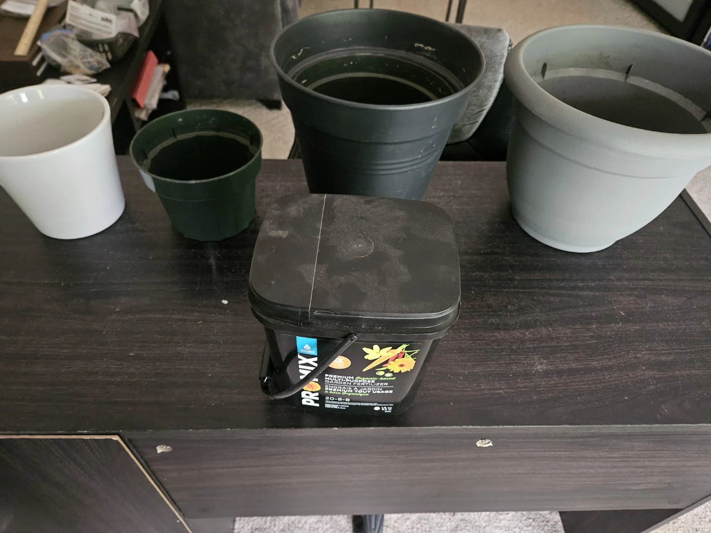 Plant fertilizer and plant pots.