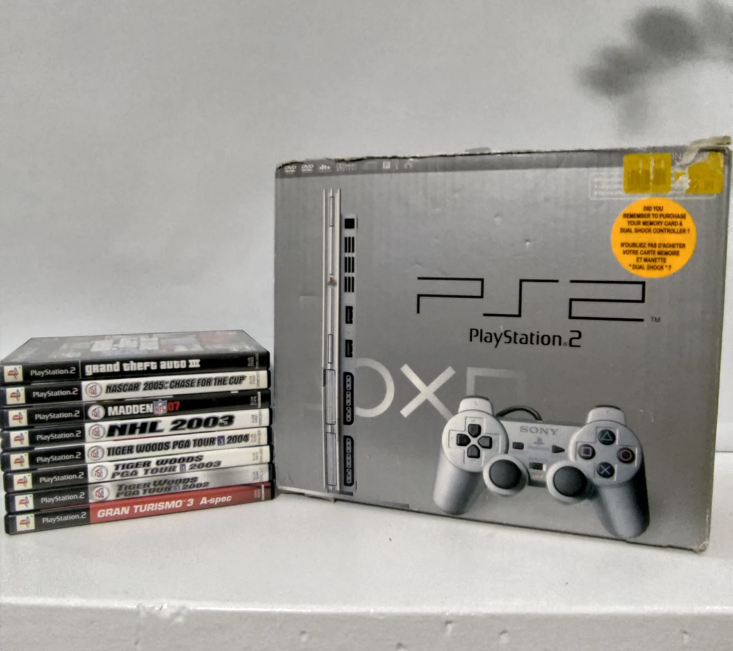 PlayStation 2 Slim Silver Console Bundle