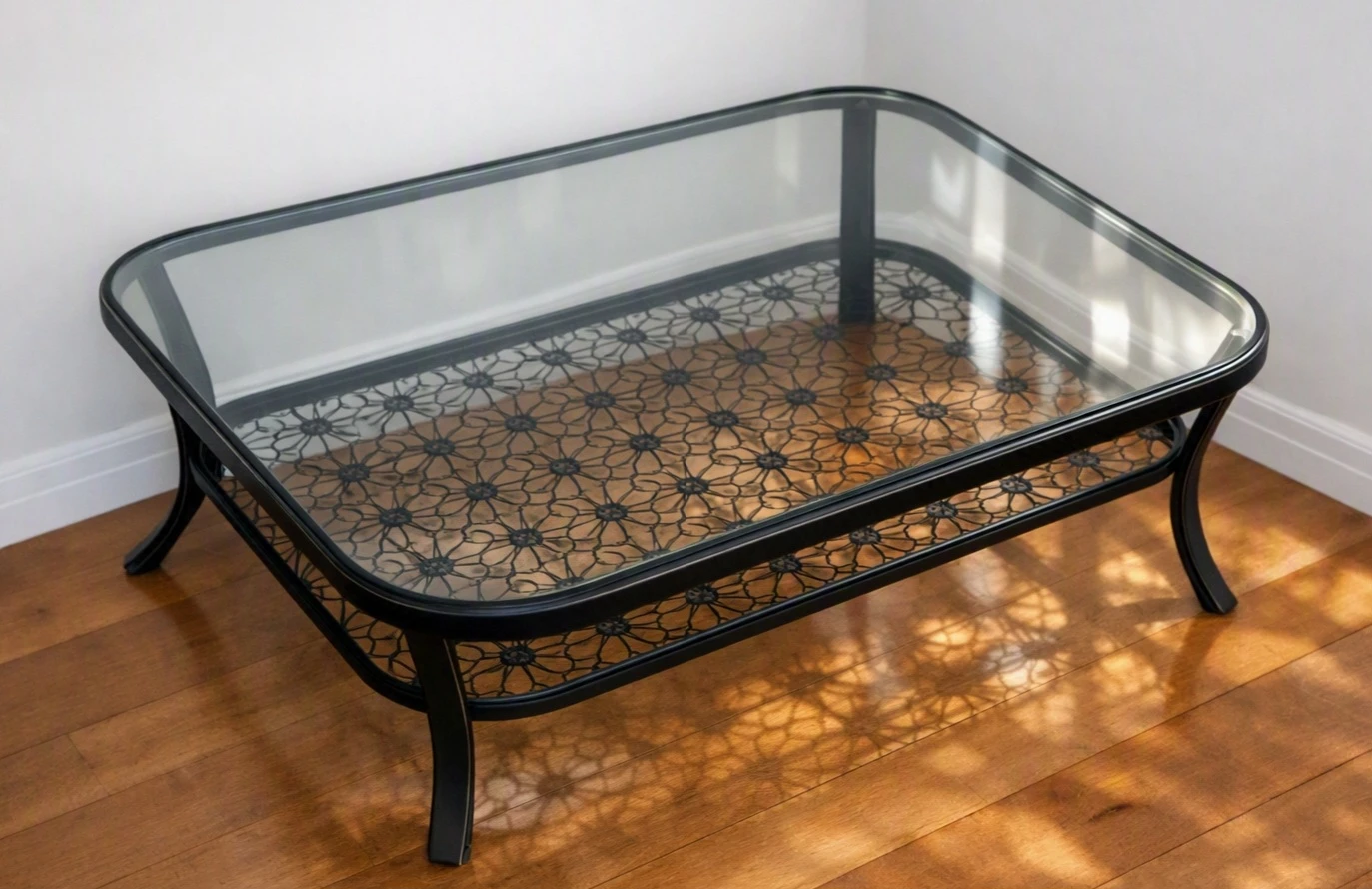 Glass top coffee table with metal base
