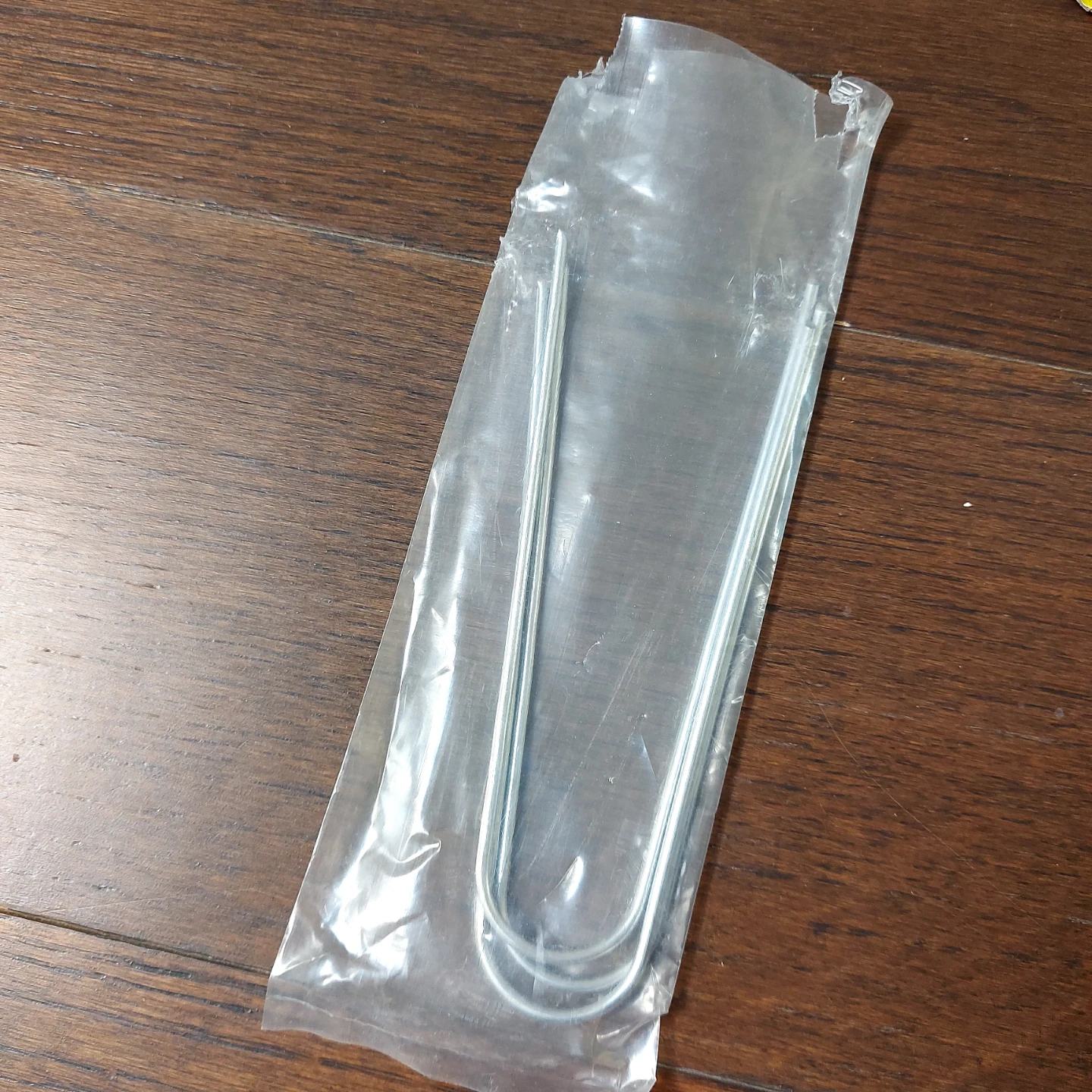 Metal U-shaped garden stakes things
