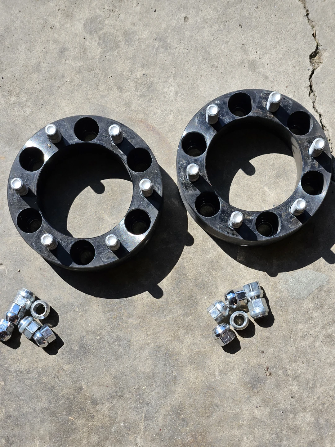 Pair of Black Wheel Spacers with Lug Nuts