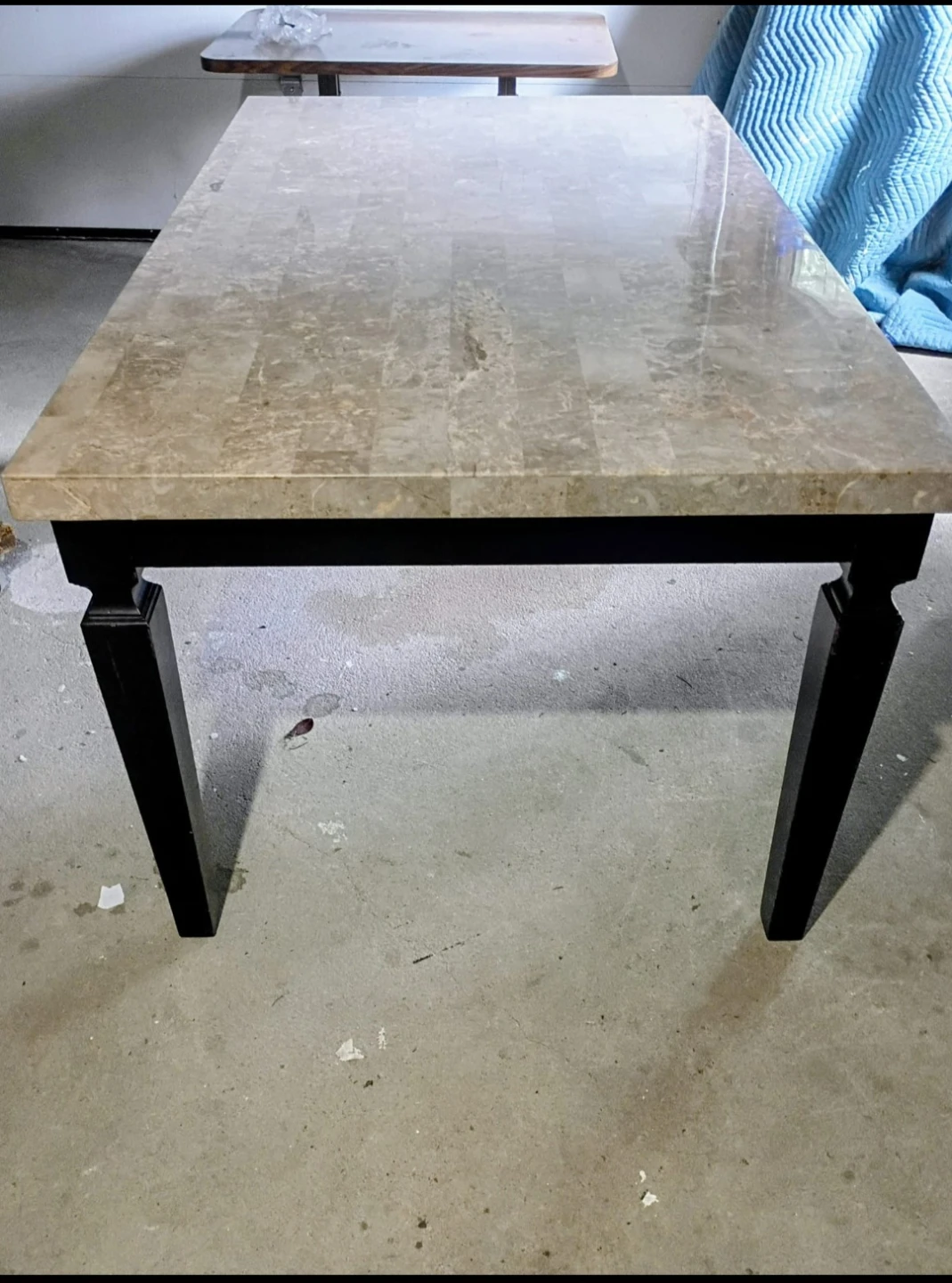 Granite table top with solid wood base