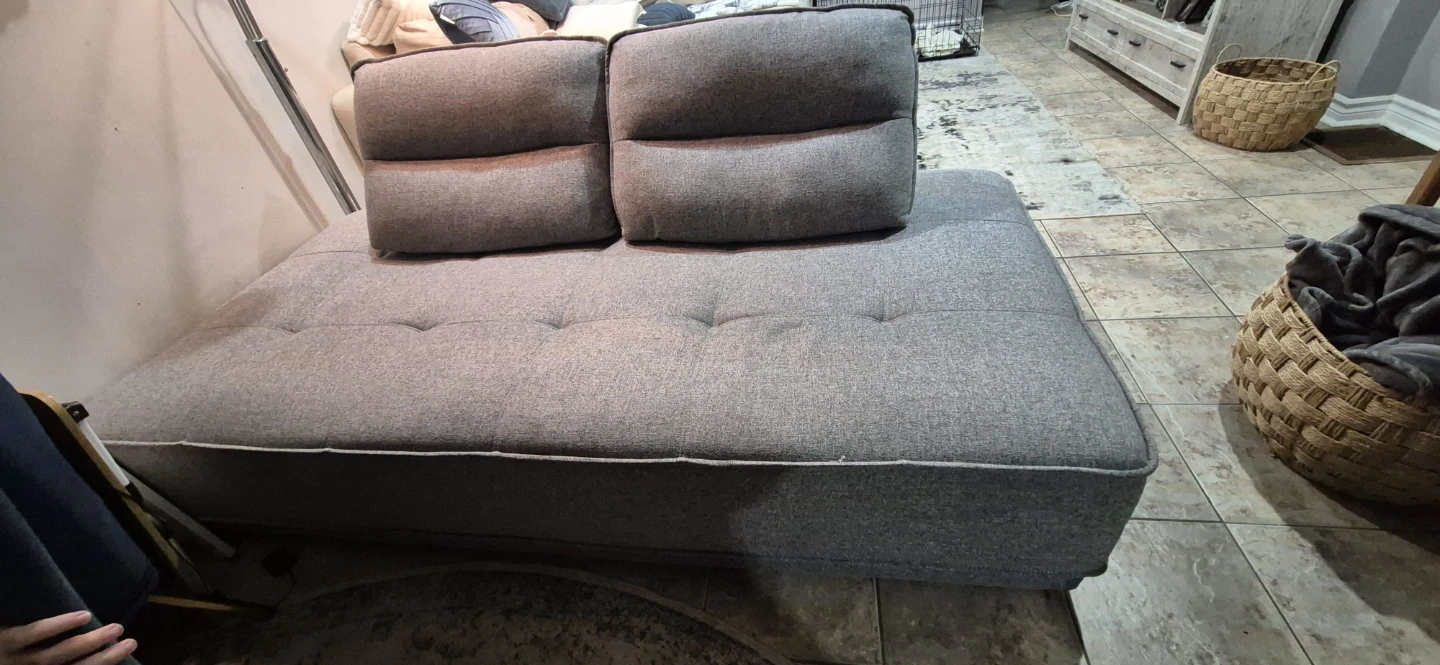 Grey daybed with two back pillows