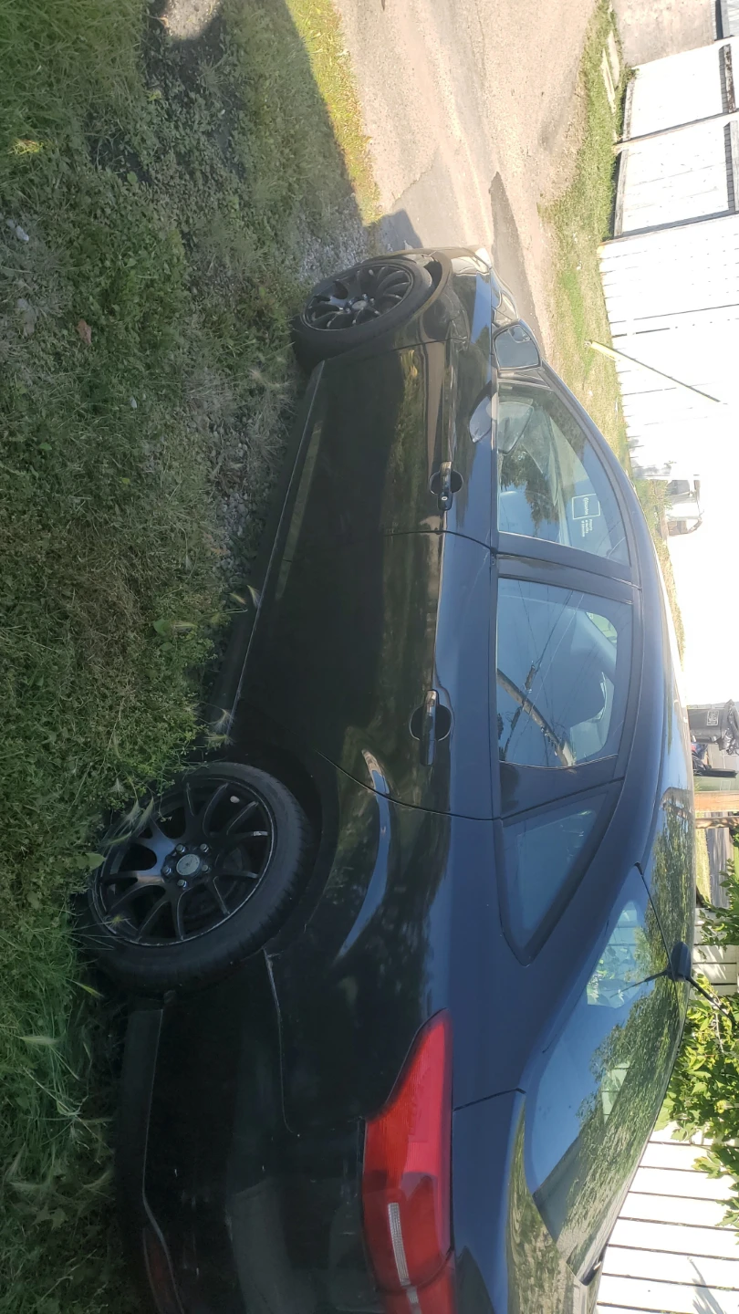 Black Ford Focus Sedan - photo 3