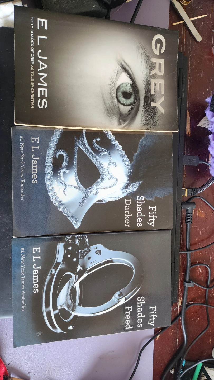 E L James Fifty Shades Trilogy Paperback Books - photo 2