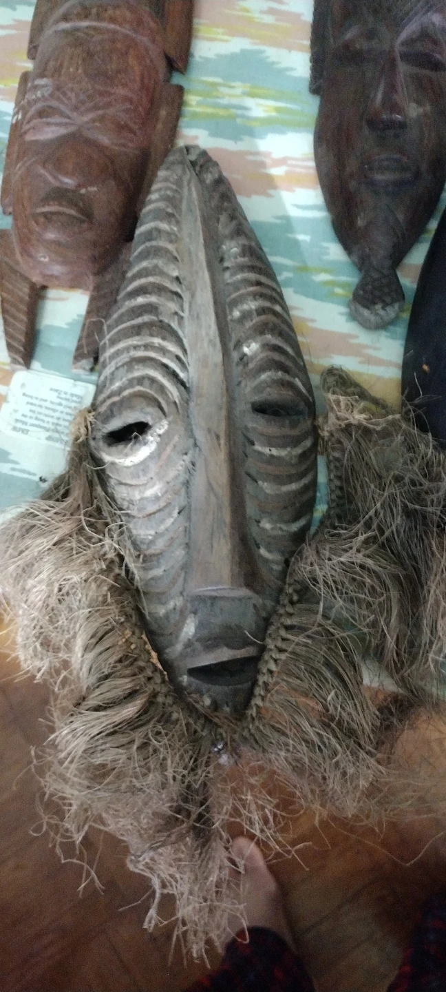 Hand-Carved Wooden Tribal Masks with Grass Hair