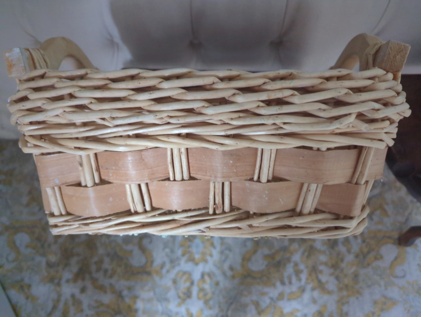 Wicker basket with wooden handles
