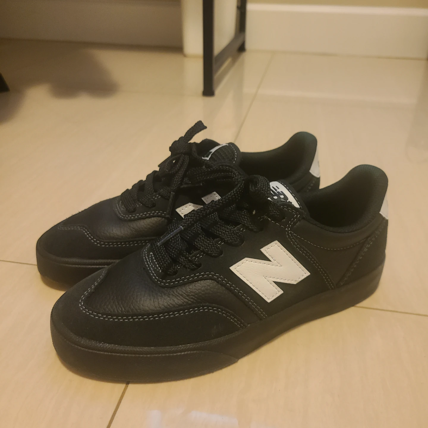 New Balance Black Leather Sneakers