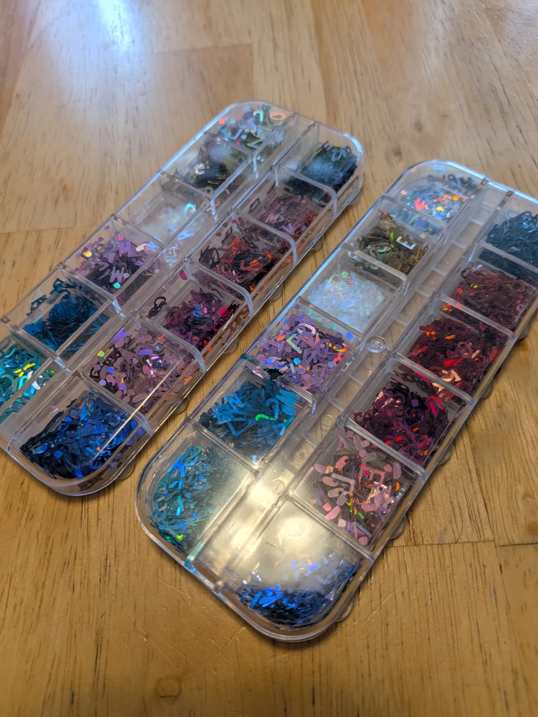 2 packs of small sparkly letters