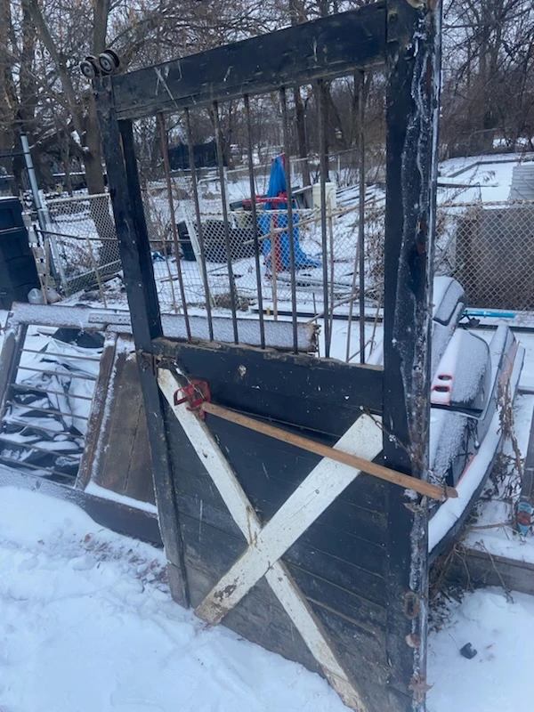 Vintage Wooden Door with Metal Grate