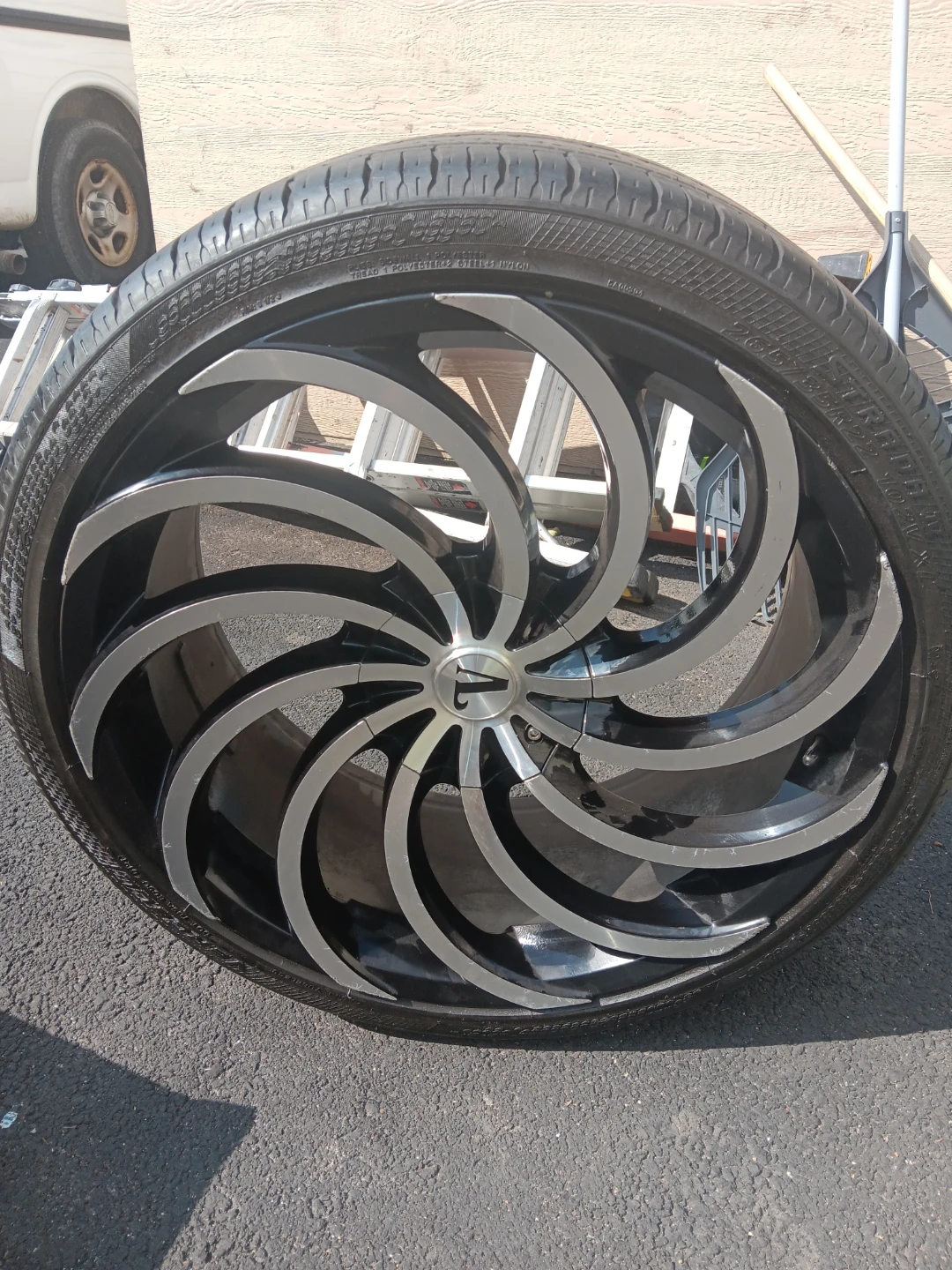Four 265/35R22 tires with rims
