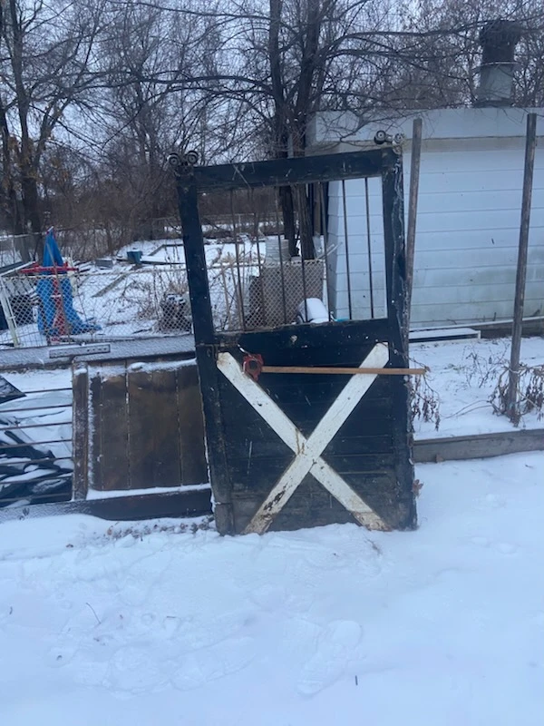 Rustic Wooden Door with Metal Grate