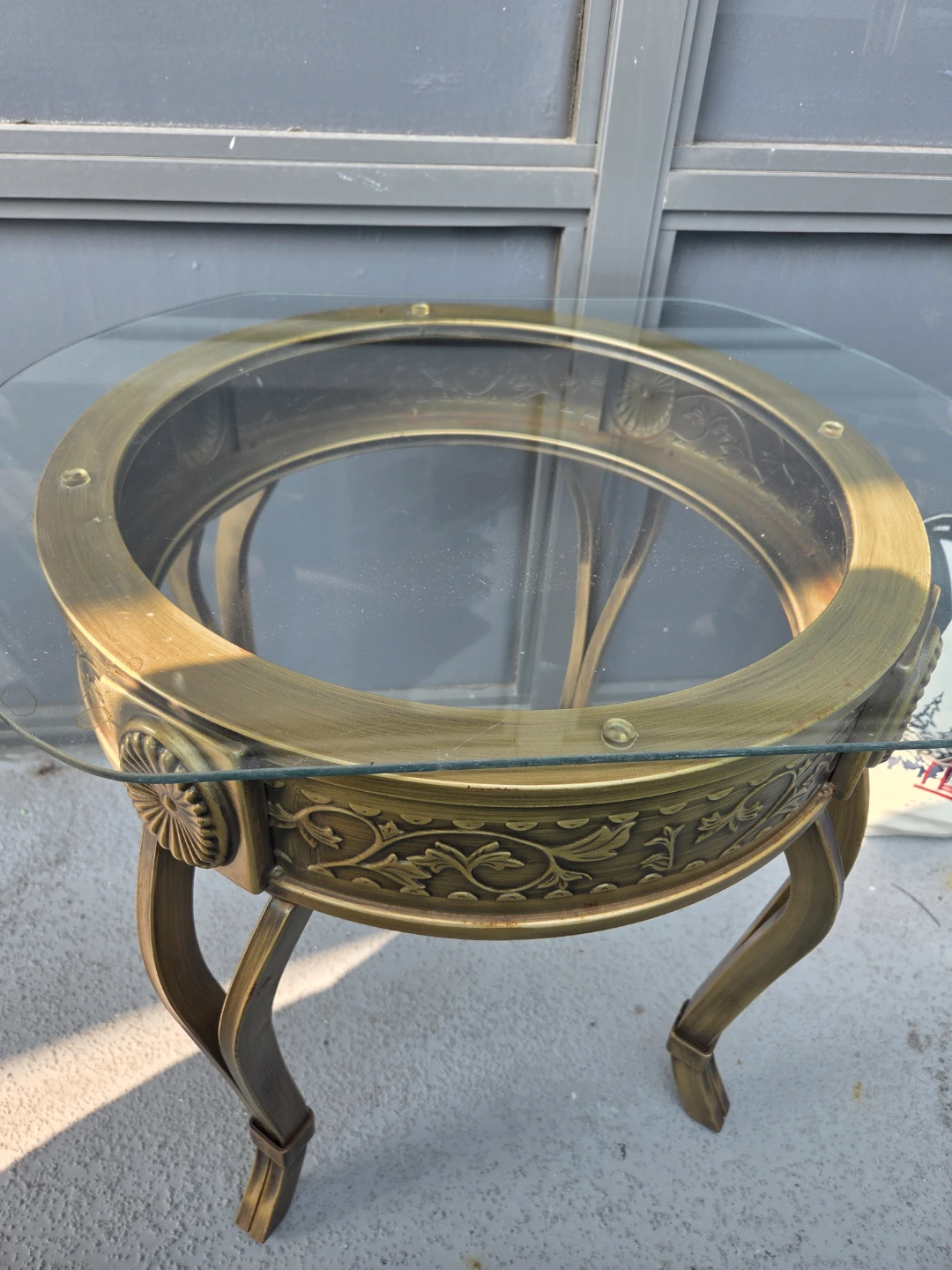 Round Glass Coffee Table with Decorative Base