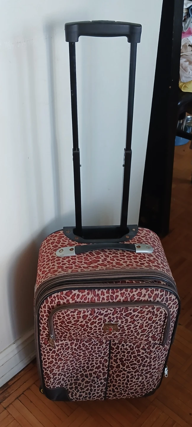 Primo Rolling Leopard Print Suitcase