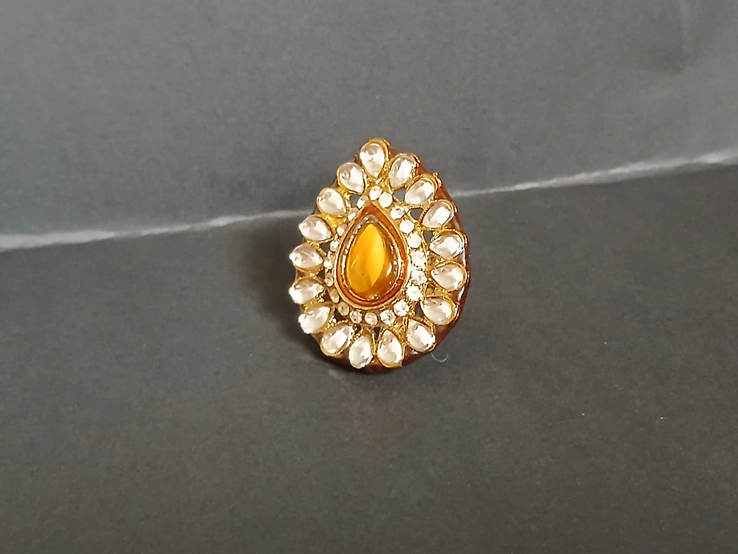 Teardrop Ring with Yellow Gem and Clear Stones