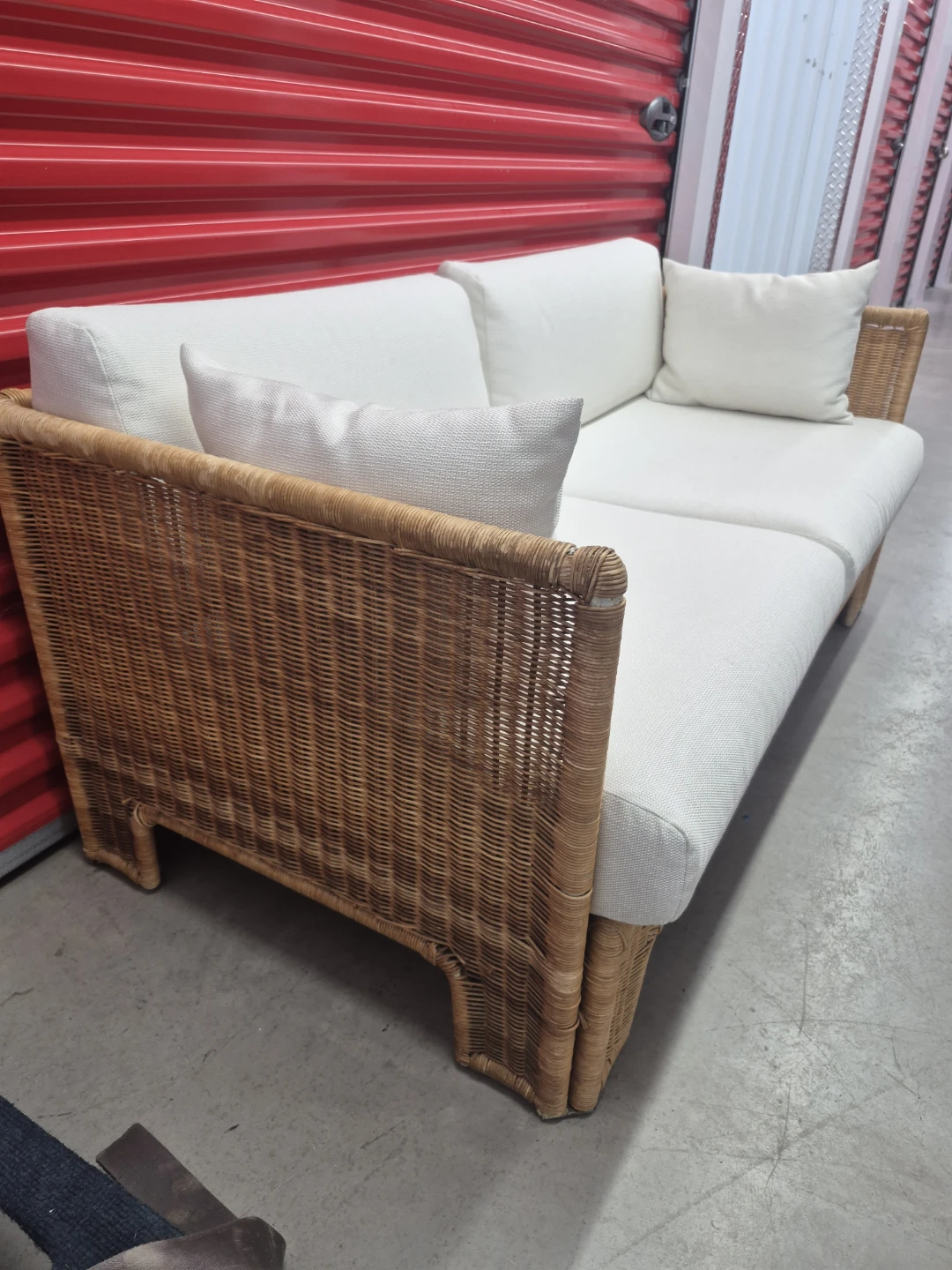 Woven wicker sofa with white cushions - photo 5