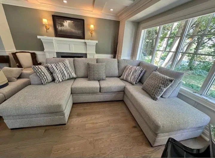 Light Gray U-Shaped Sectional Sofa with Throw Pillows