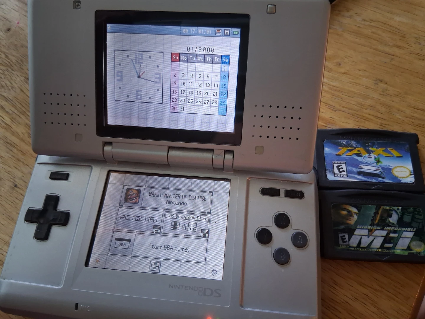 Phat Nintendo DS Silver + 4 game bundle