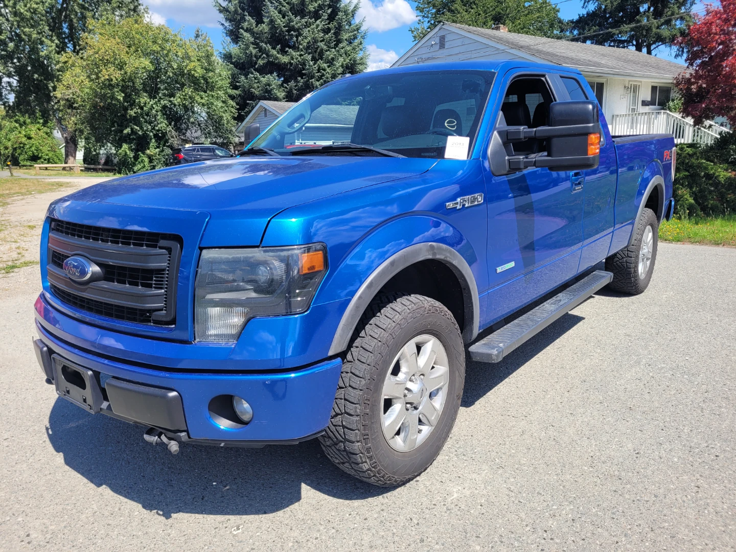 Blue Ford F-150 FX4 Off-Road Pickup Truck