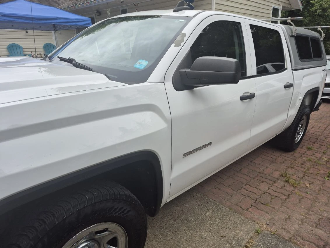 GMC Sierra Truck with Arrow Cap