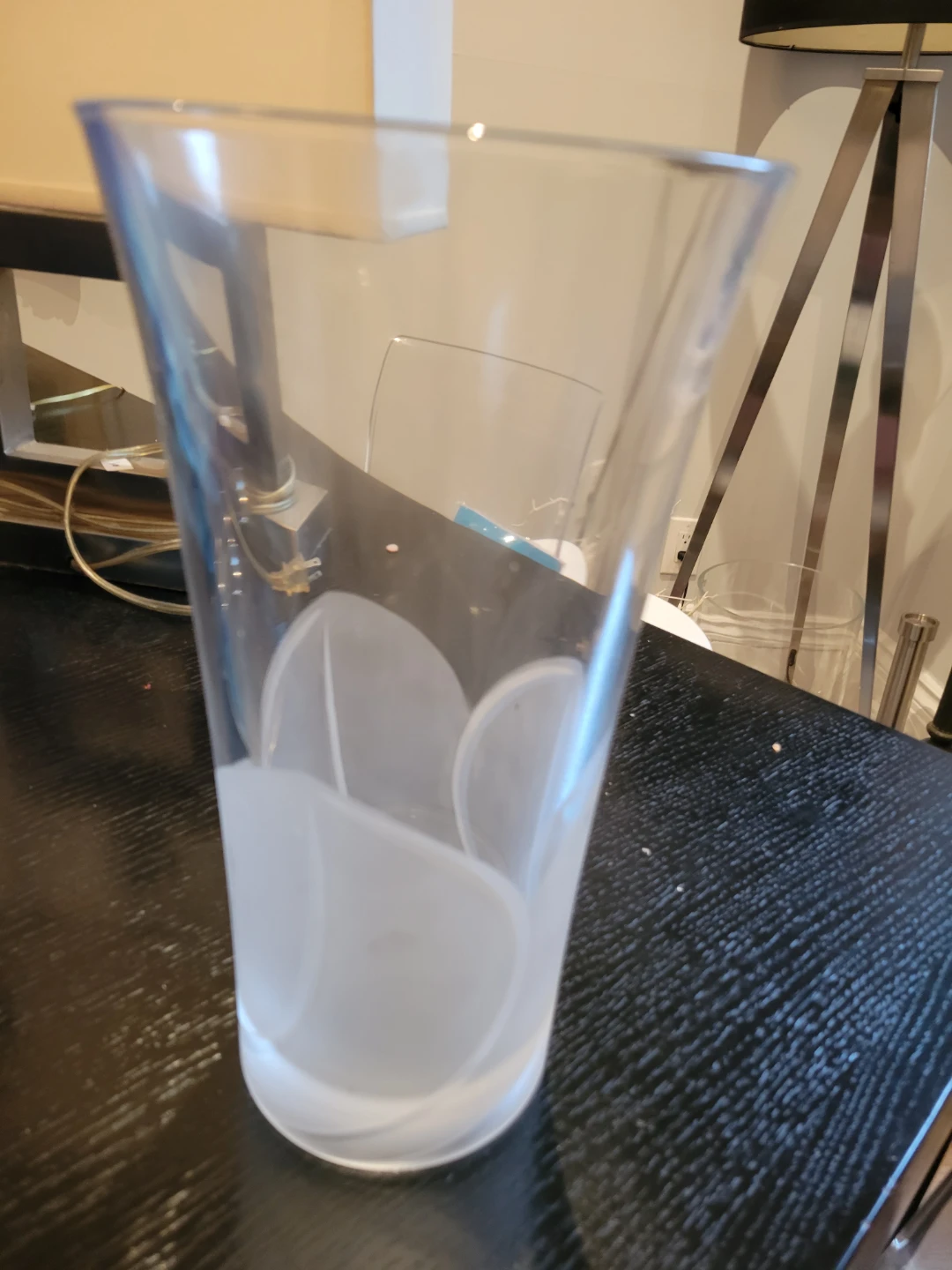 Clear glass vase with white design