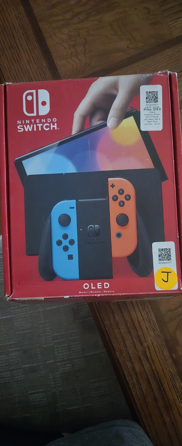 Nintendo Switch OLED Model with Neon Red & Blue Joy-Con