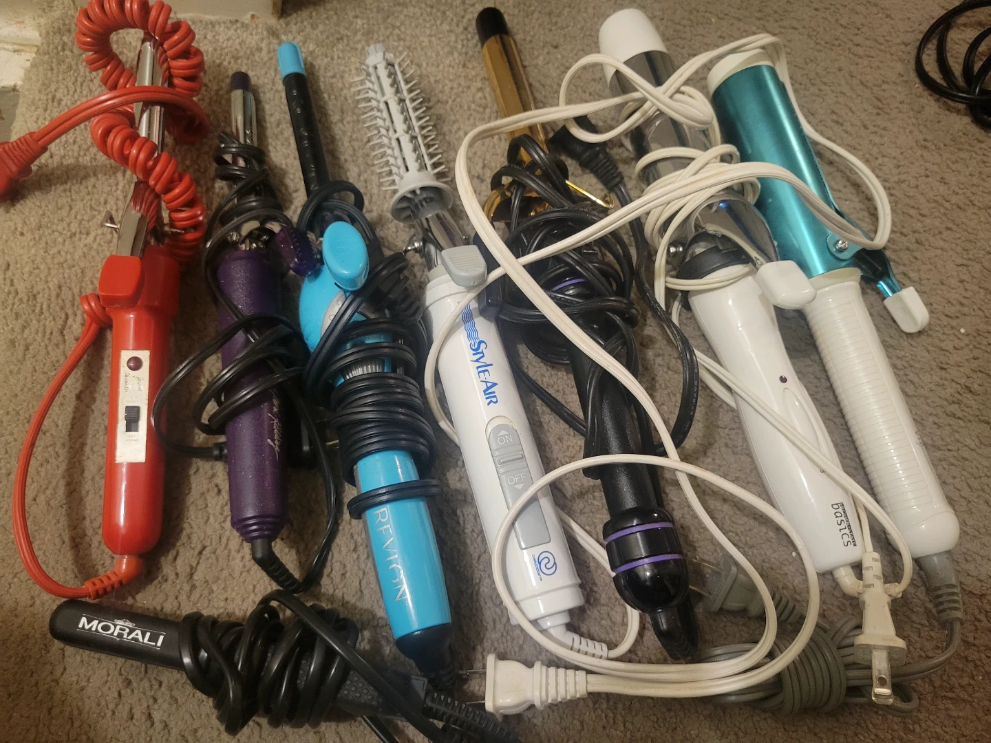 Assorted Curling Irons and Styling Tools