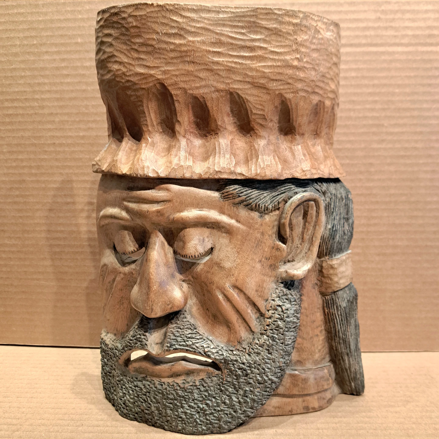 Mask of a man in a hat