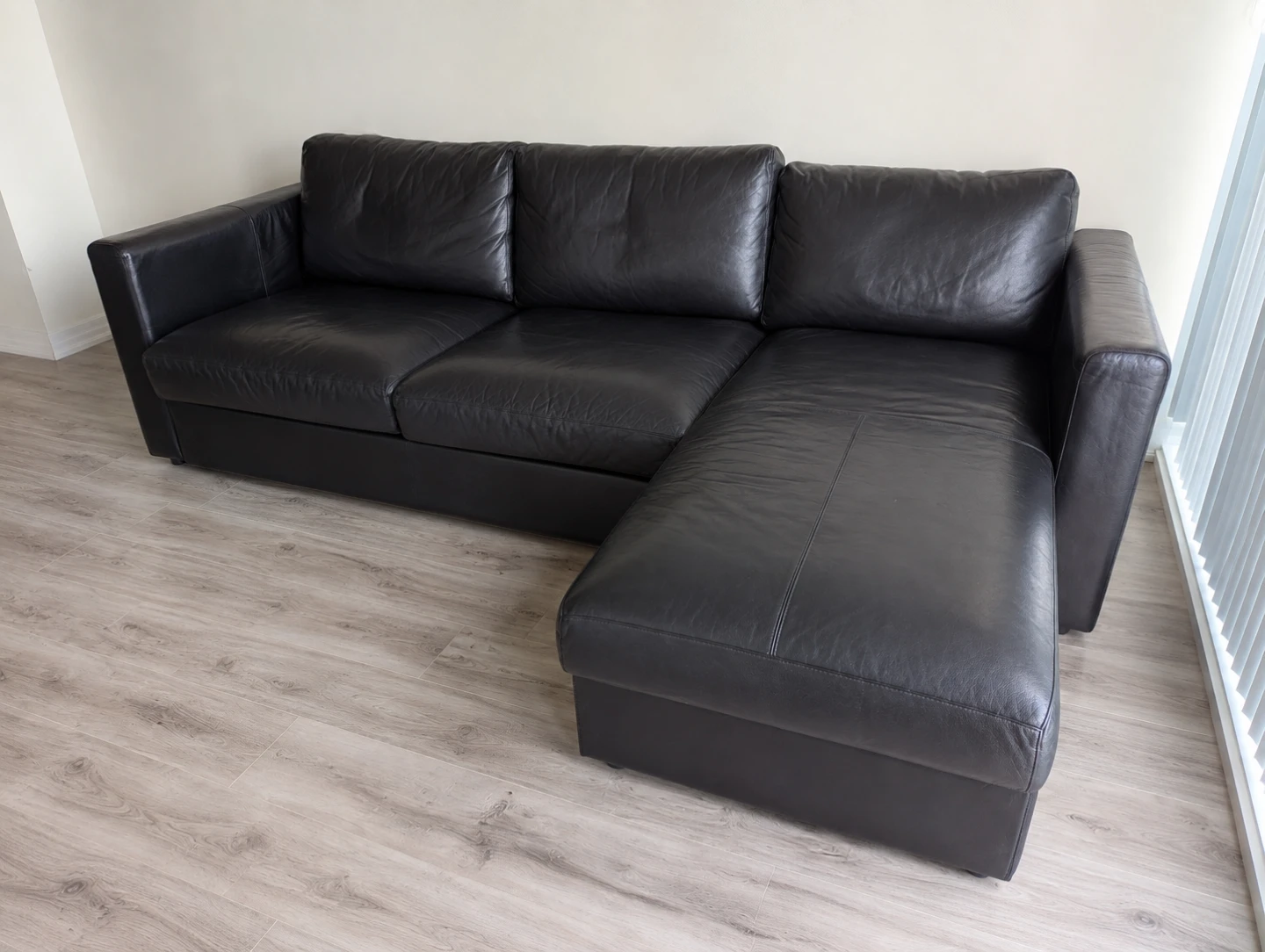 Black Leather Sectional Sofa with Storage and Sleeper Function