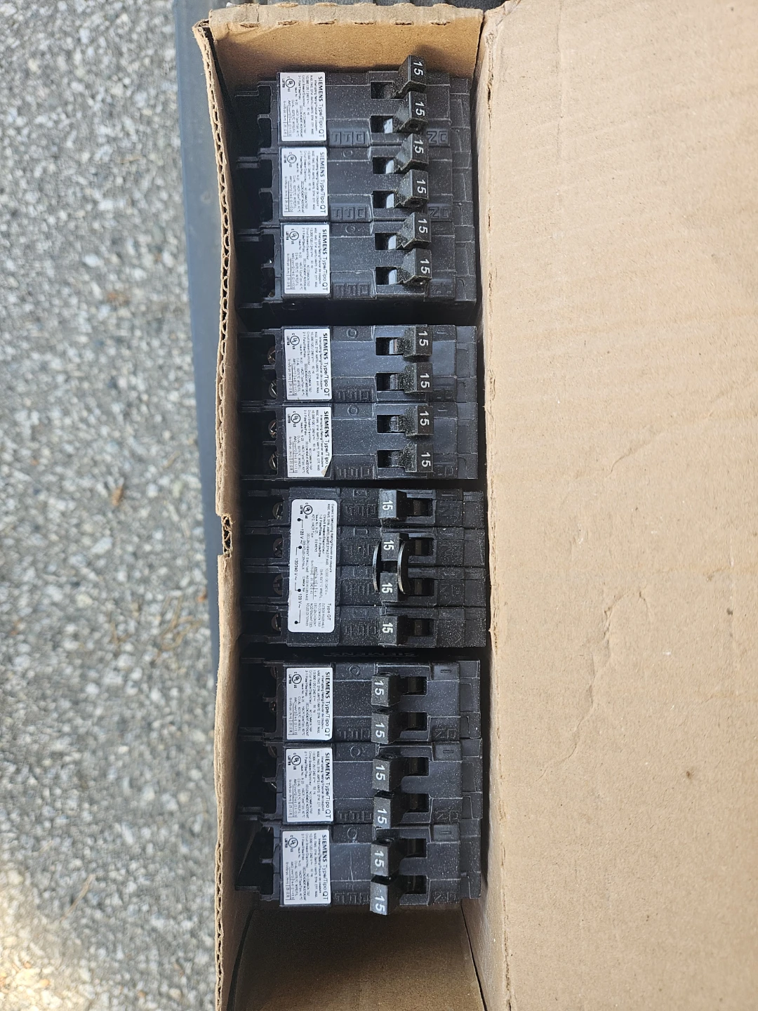 Various Siemens push on circuit breakers.