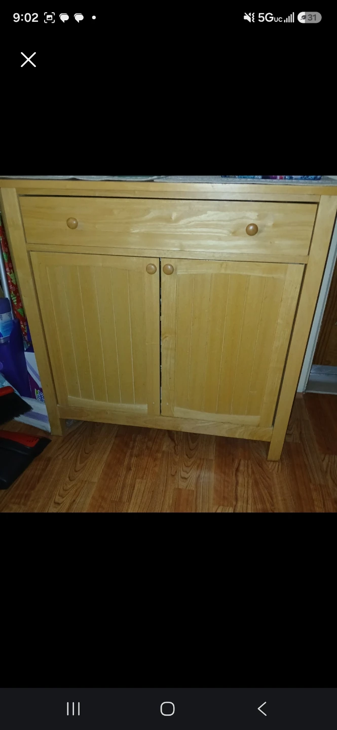 Wooden cabinet with drawer and doors