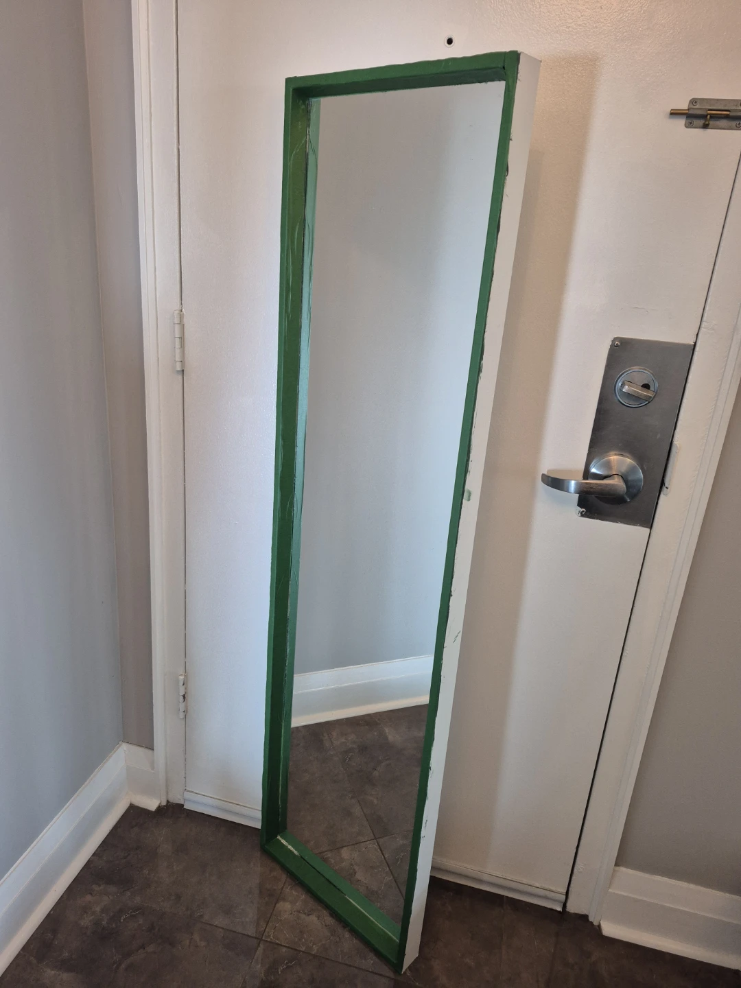Full length wall mirror with green frame