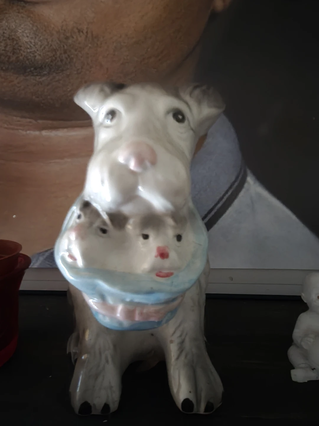 Ceramic Dog Figurine with Multiple Faces