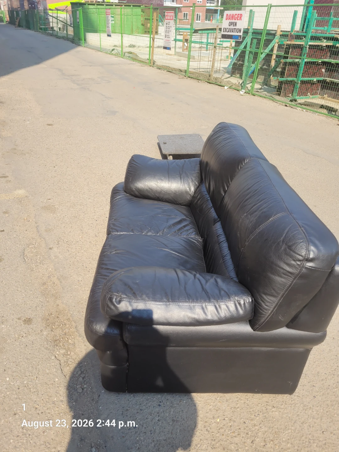 Black leather loveseats