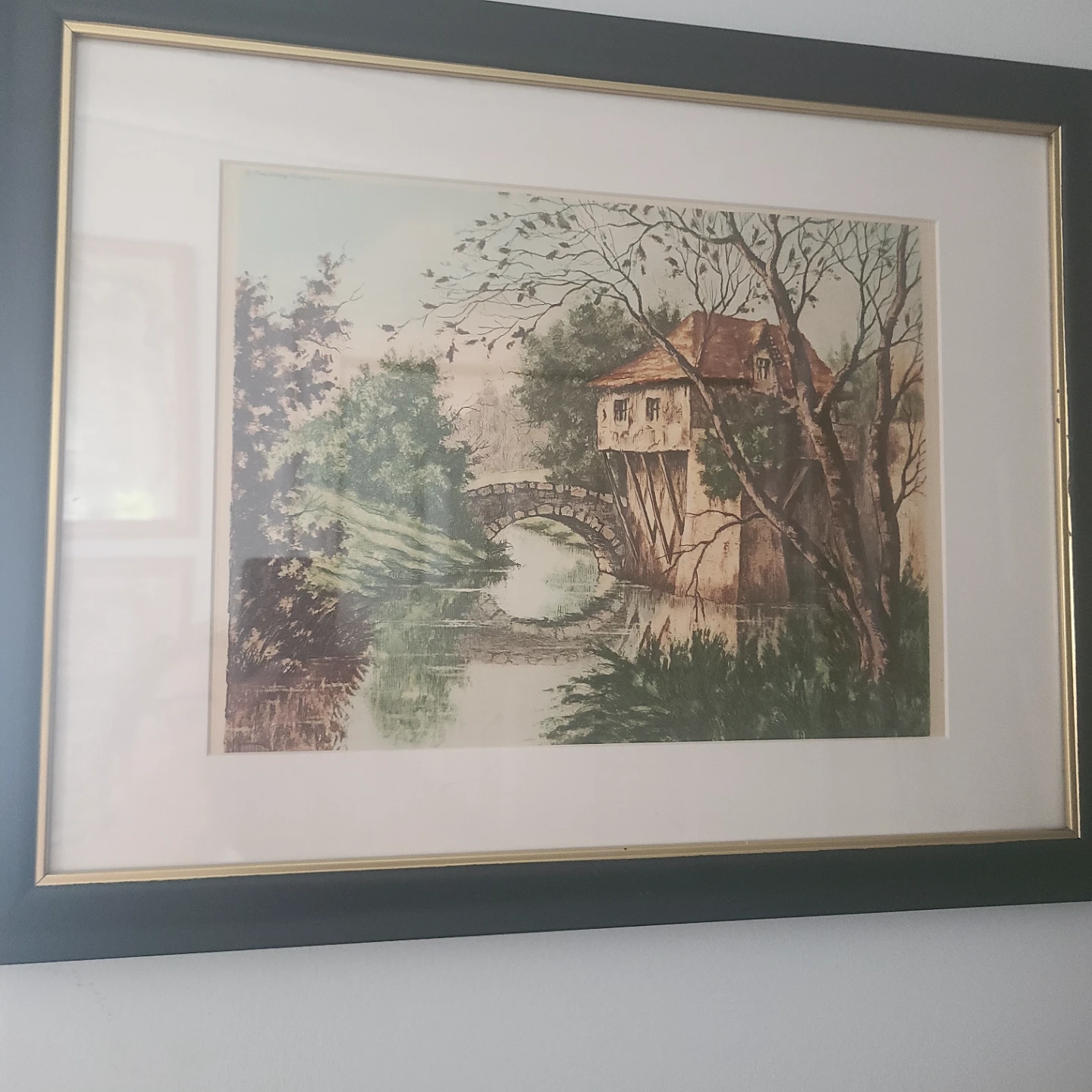 Framed Landscape Painting of a House by a River