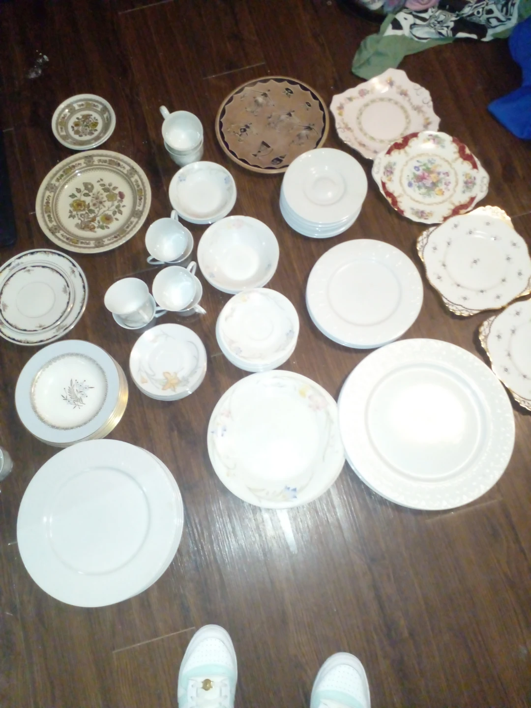 Assorted Ceramic Plates and Cups
