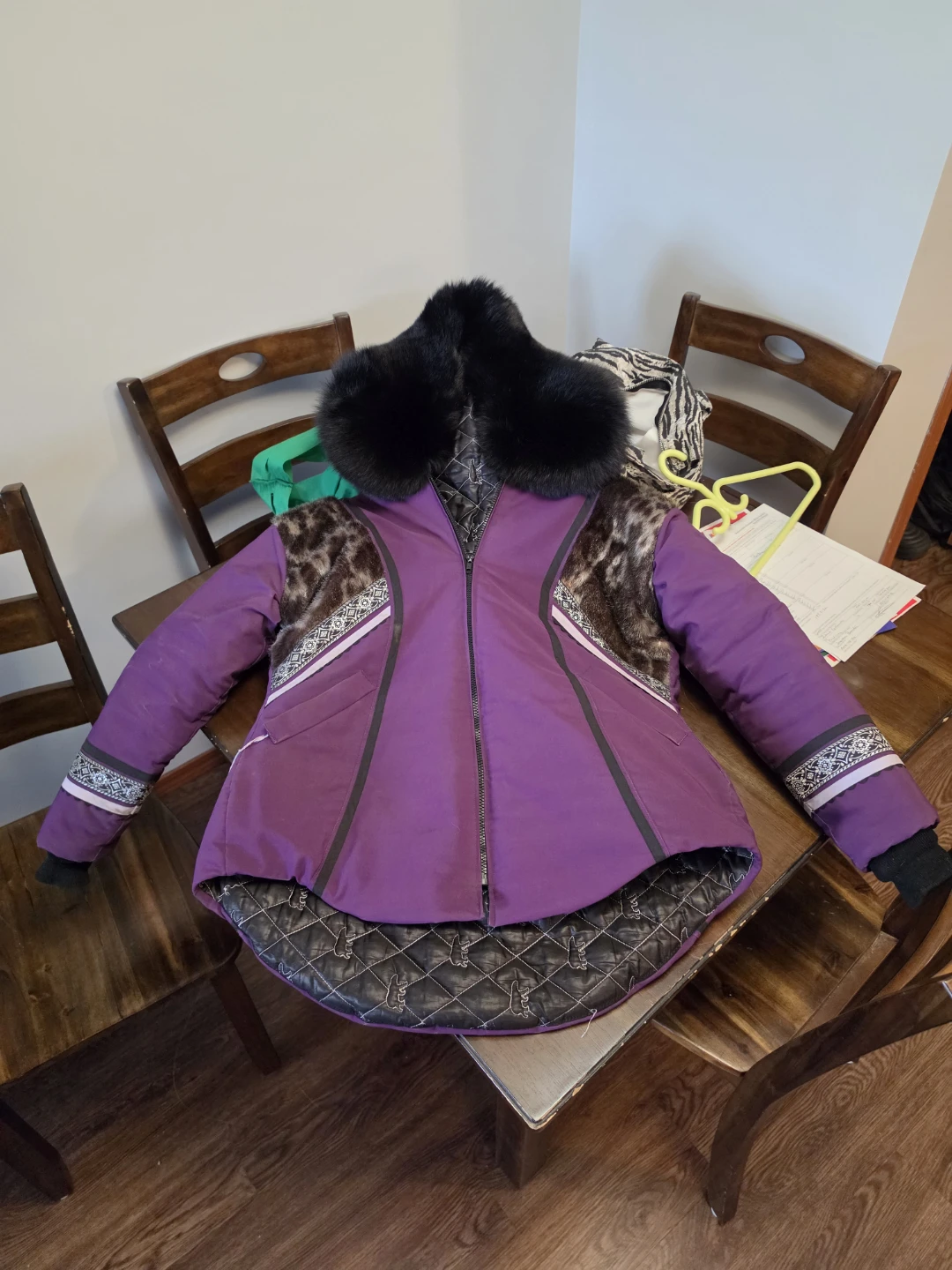 Purple quilted winter jacket with fur trim